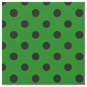 Stor polka dots - svart på grönt tyg