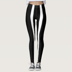 Stora baljväxter av svart och vitt rand leggings