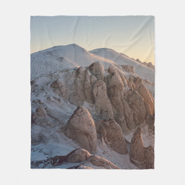 STORA STEN-FORMATIONER SOM OMFATTAS AV SNÖ FLEECEFILT (Framsidan)