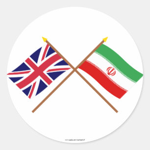 Storbritannien och Iran Crossed Flaggor Runt Klistermärke
