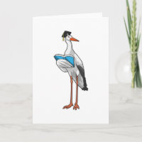 Stork som lärare med bok