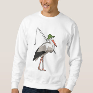 Stork vid fiske med fiskstång lång ärmad tröja
