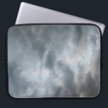 Storm Clouds Breaking Laptop Fodral<br><div class="desc">Mörkens stormiga moln bryts sönder i förgrunden till detta färg-fotografi. Molnet lagrar blir ljusare skuggor av grått djupare i bilden. Ljusets tipshjälp blå himmel syns utanför stormmolnen när vädret börjar rensa upp. Digital,  färg-fotografi. Copyright © 2010 Claire E. Skinner. Alla höger reserverade.</div>