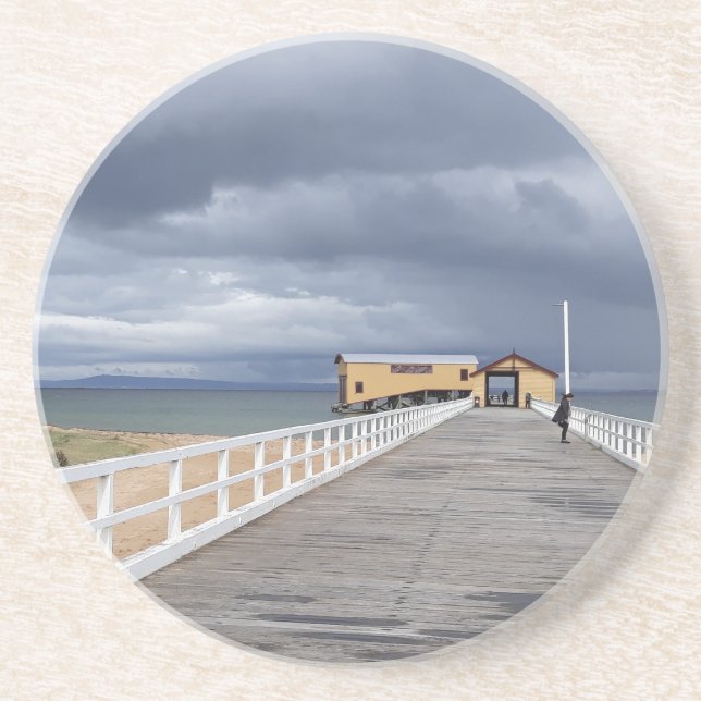 Storm över Queenscliff Pier Underlägg (Framsidan)
