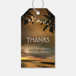 Strand solnedgång sladdlyktor palmer bröllop presentetikett