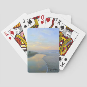 Strand som leker kort casinokort
