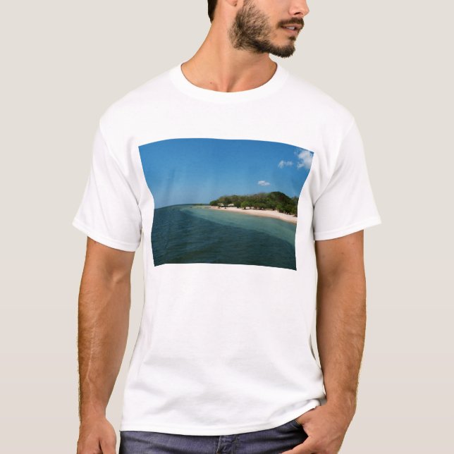 Stranden förändrar sig in tee (Framsida)