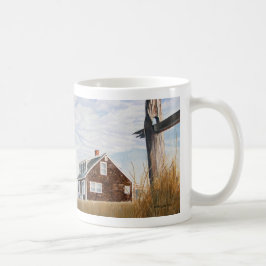 Strandhus soluppgång kaffemugg