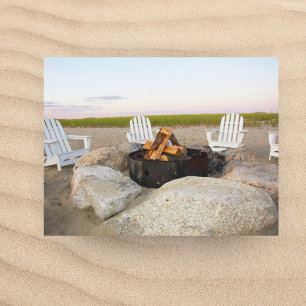 Strandlägereld vid skymning Cape Cod vykort