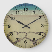 Strandtemahjärtor i Sand