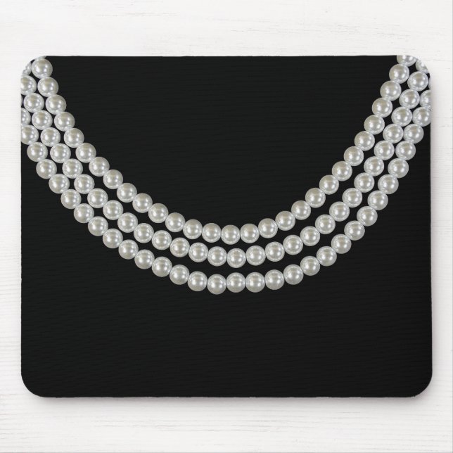 Sträng av pärlor på svart musmatta (Framsidan)