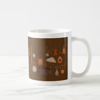Stränga musikalen instrumenterar kaffemugg