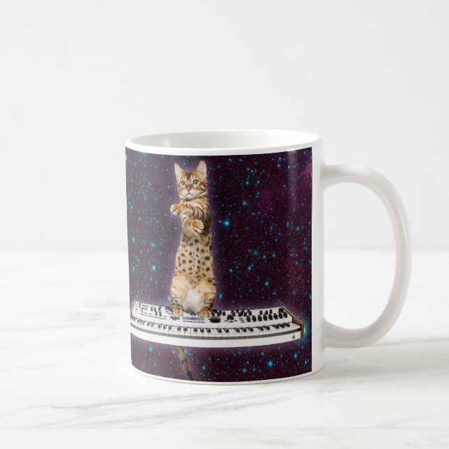 strejkor av katt från tangentbord igen kaffemugg (Höger)