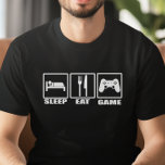 Strömsparläge och spelfantomin tee<br><div class="desc">Sov Eat och T-Shirt - Nivå upp din stil-faktor eftersom perfekt T-shirt för spelare med hård kärna äntligen är här. Den här skjortan med vägskyltssymboler för ät och strömsparläge och en datorspelkontrollant i det tredje tecknet med meddelandet: Strömsparläge, Ät och spel. Den här ultrafunkyn är en riktig spelväxlare och kommer...</div>
