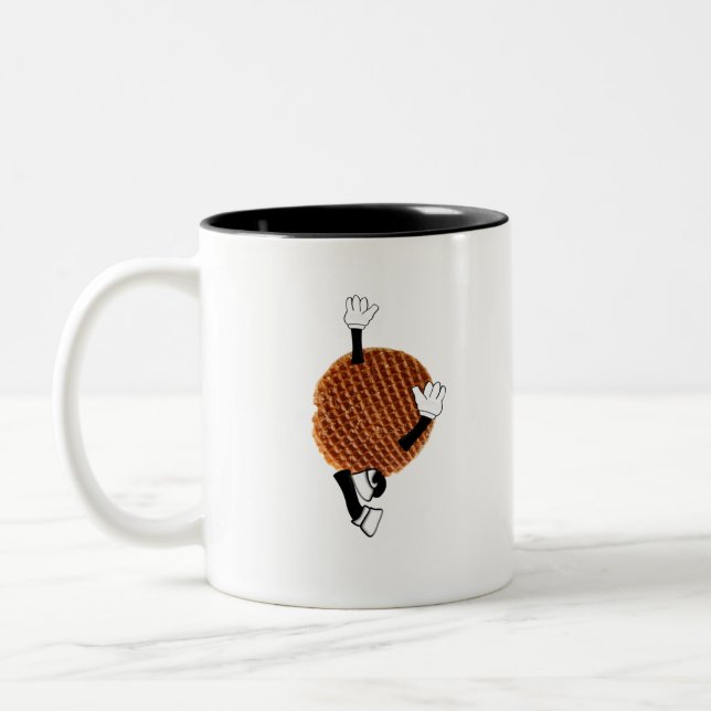 Stroopwafel hoppar för glädje. Två-Tonad mugg (Vänster)