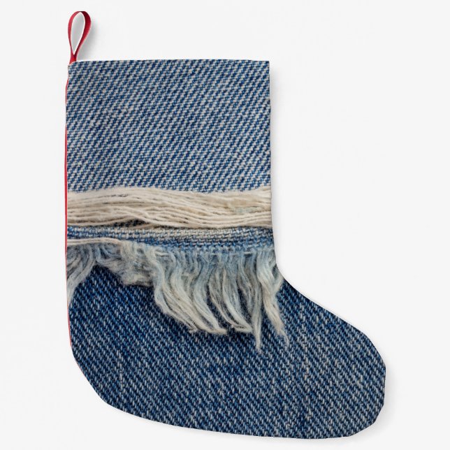 Struktur har rivit jeans bakgrund. liten julstrumpa (Framsidan)