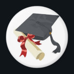 Studentmössa och diplomati magnet<br><div class="desc">Svart diplomathatt och diplomatkaval i studenten, upprullade och säkrade med en röd färgad-band</div>