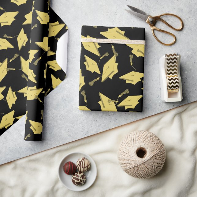 Studentmössorna guld i Luft vid Svarta Roligten Pa Presentpapper (Hantverk)