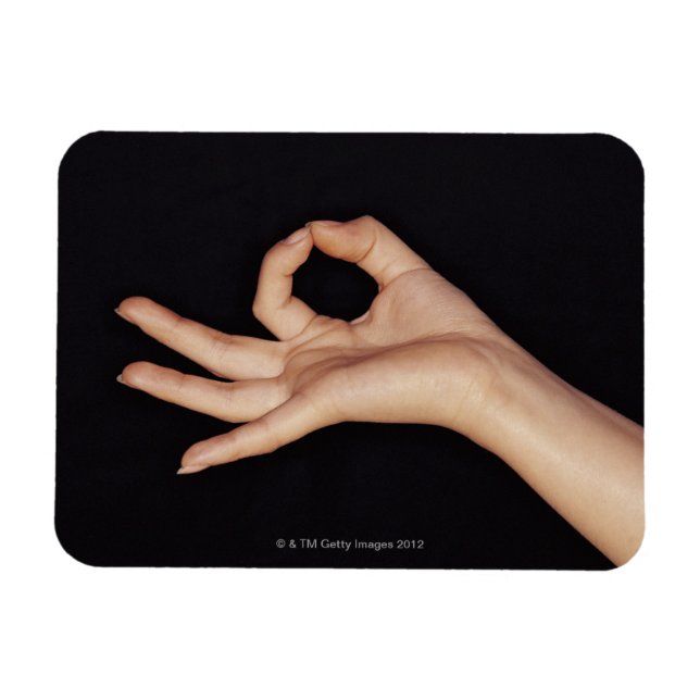 Studio shot of hand gesturing a Sign Magnet (Horisontell)
