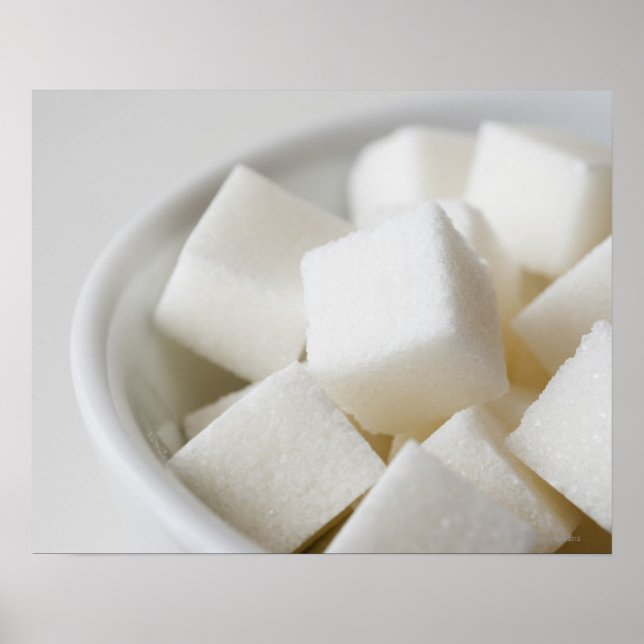 Studio-skott av sockerbitar i skål poster (Framsidan)