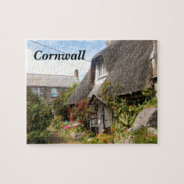 Stugor på Cadgwith Cornwall fotograferar Pussel