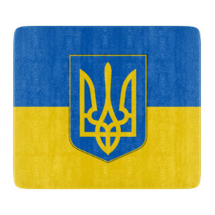 Styckningsbord av litet glas med ukrainska flagga