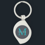 Stylis och personlig monogrammat swirl silverfärgad nyckelring<br><div class="desc">Lägg till en något sofistikerad ton i nycklar med vår Elegant Grått och Bluish Monogram Initial Keychain. Den här nyckelkedjan har en elegant bakgrund av grått, en slående inledande, blåaktig monogram, och ditt namn visas elegant över monogrammet. Den är perfekten för att lägga till en personlig till dina vardagsbehov. Perfekt...</div>