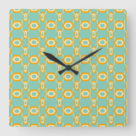 Stylized geometric pattern in bold orange hexagon fyrkantig klocka