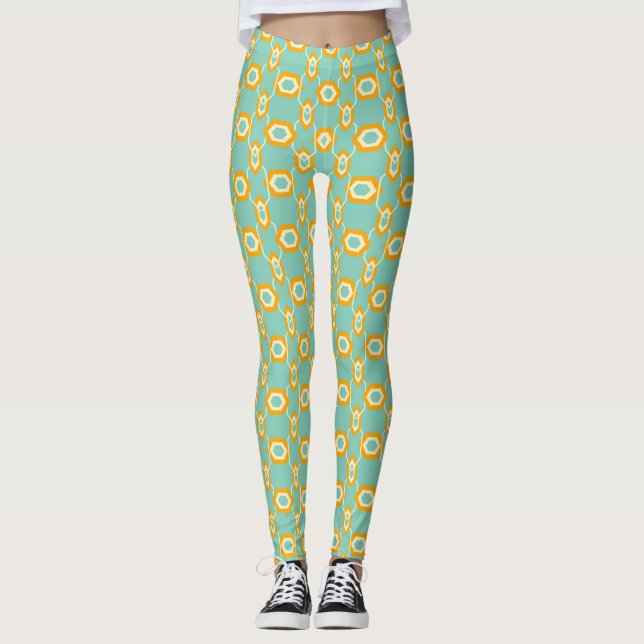 Stylized geometric pattern in bold orange hexagon leggings (Framsida)