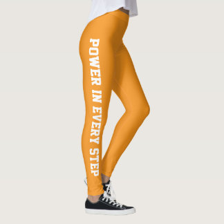 Styrka i varje steg i lagarna för Motivational Grö Leggings