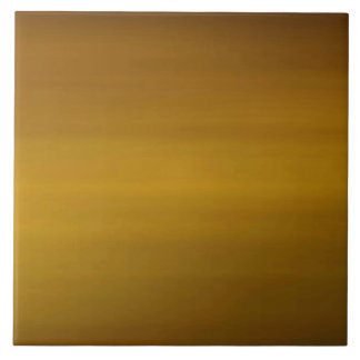 Subtilt guld kakelplatta