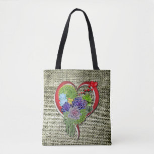 Sukulär växtdekoration inom ett hjärta tygkasse