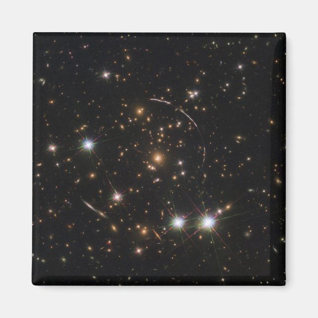Sunburst Arc in a Massive Galaxy Cluster Magnet (Framsidan)