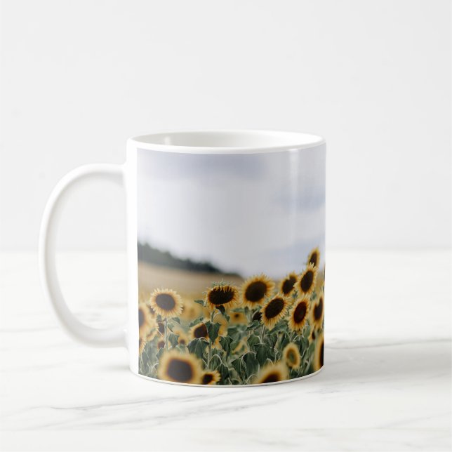 SUNFLÖDESFOTOS NEDLÄGGNING KAFFEMUGG (Vänster)