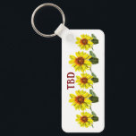 Sunflower Keychain Nyckelring<br><div class="desc">Display a natural vibe with this abundance of amber sunflowers keychain. This design has a warm feel due to its amber and orange palette. Express yourself by experimenting with different background colors and added text.</div>