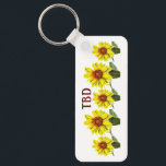 Sunflower Keychain Nyckelring<br><div class="desc">Display a natural vibe with this abundance of amber sunflowers keychain. This design has a warm feel due to its amber and orange palette. Express yourself by experimenting with different background colors and added text.</div>