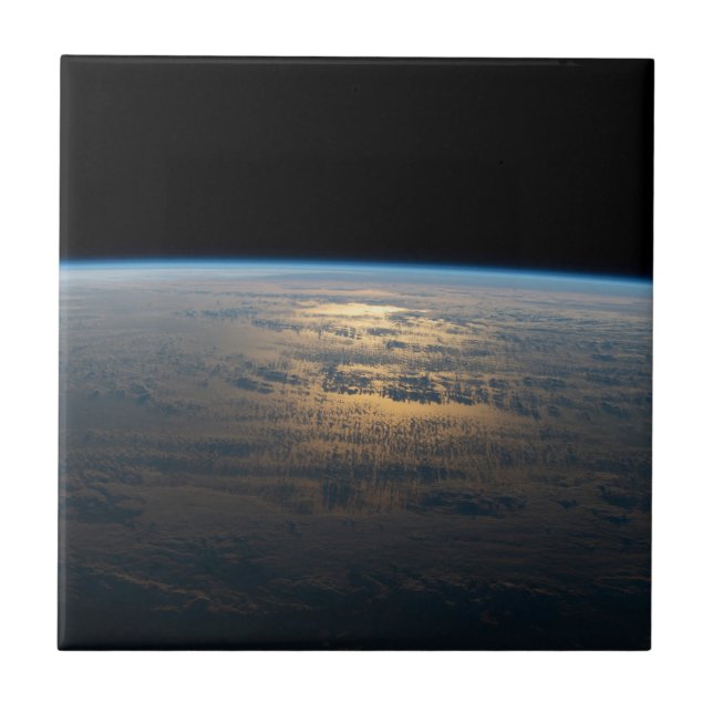 Sunglint Beams från en delvis grumlig södra Stilla Kakelplatta (Framsidan)