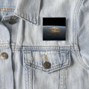 Sunglint Beams från en delvis grumlig södra Stilla Knapp