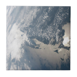 Sunglint på jordens Vatten. Kakelplatta
