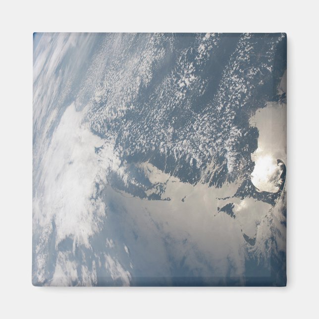 Sunglint på jordens Vatten. Magnet (Framsidan)