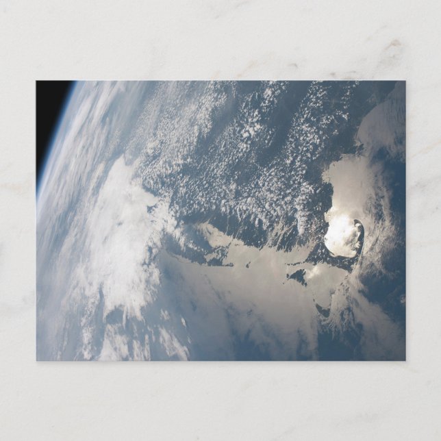 Sunglint på jordens Vatten. Vykort (Framsida)