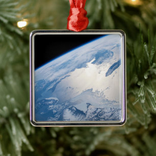 Sunglint utanför St. Lawrence Bukt i Kanada. Julgransprydnad Metall