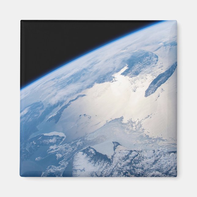 Sunglint utanför St. Lawrence Bukt i Kanada. Magnet (Framsidan)