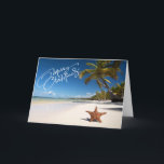 Sunny Beach med Starfish-julkort Helgkort<br><div class="desc">Varm julen önskemål från stranden! En vacker solig strand med handflatan träd och havet vinkar som kraschar längs sanden. Det finns en stjärnfisk i sanden på stranden. Längs framtill står det "God jul". Ta en titt på hur många designerna är och stilar i vår butik.</div>