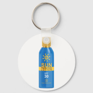 Sunscreenlotion på vit nyckelring