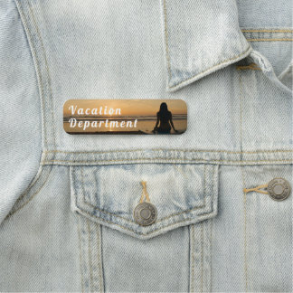 Sunset Over a Quiet Beach Namnbricka