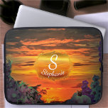 Sunset Plaza Marina 2584 Laptop Fodral<br><div class="desc">Färglägga "Sunset Plaza Marina 2584"-samlingen Anpassa på produktsidan eller klicka på knappen "Anpassa" om du vill ha fler designalternativ. Den utformning som skapades från min målning "Sunset Plaza Marina 2584" fångar upp ett vibrerande solnedgång med orange och rött färg som fyller himlar, inramad av silhuetterade vegetations- och blommar växter i...</div>