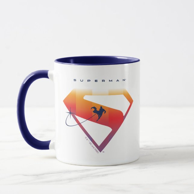 Sunset Soar Superman Shield Mugg (Vänster)
