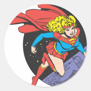Supergirl hoppar i utrymme runt klistermärke