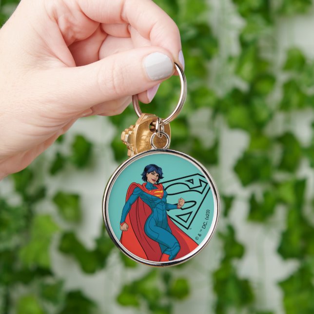 Supergirl Hovering i Blue Kostym Rund Silverfärgad Nyckelring (Hand)